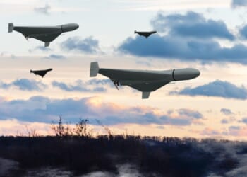 A group of military combat drones Shaheed flying over a forest, smoke from military action in Ukraine, evening lighting.