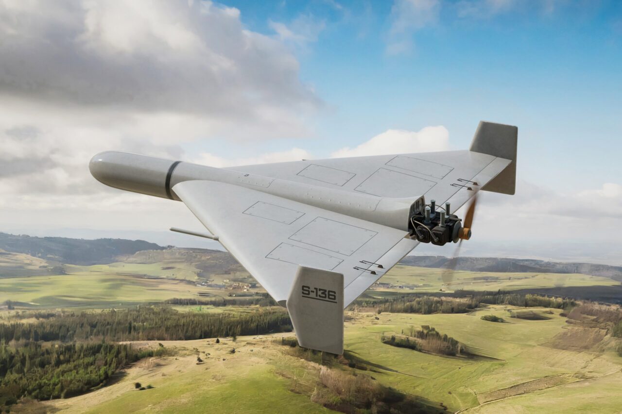 A Shahed-136 military drone flying in the air.