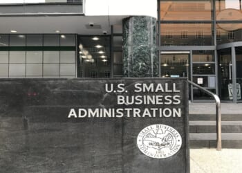 SMALL BUSINESS ADMINISTRATION sign emblem seal at headquarters building entrance. SBIR
