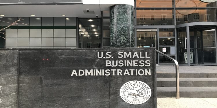 SMALL BUSINESS ADMINISTRATION sign emblem seal at headquarters building entrance. SBIR