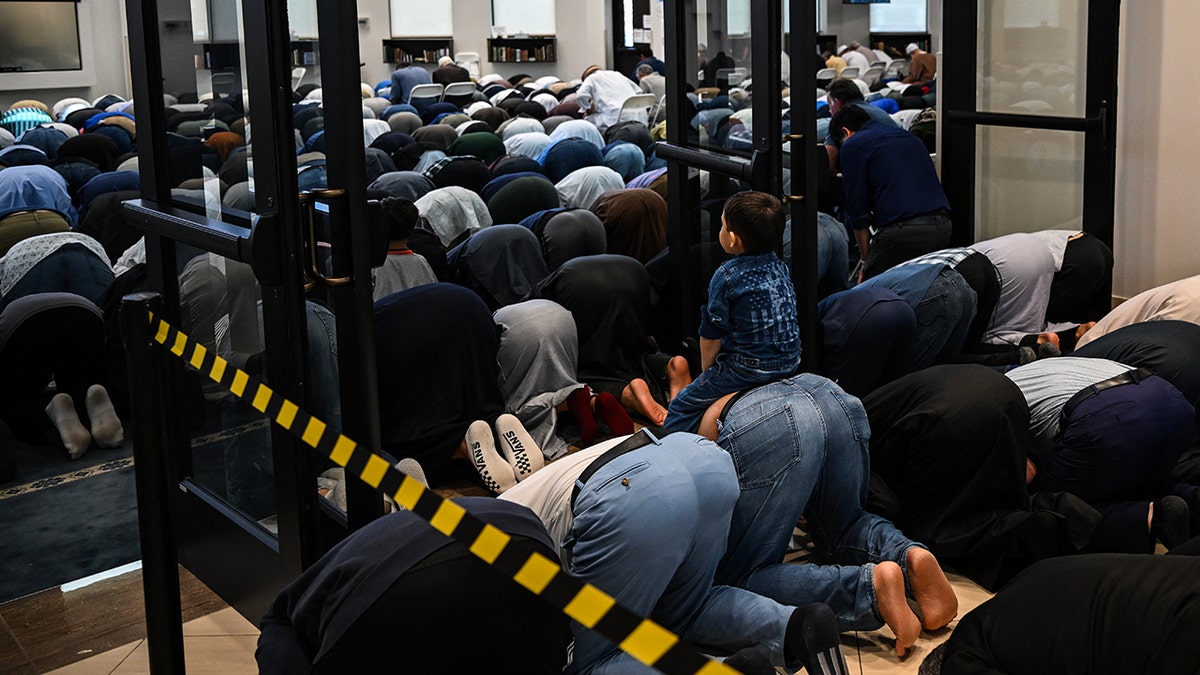 Muslim men pray at mosque in Texas