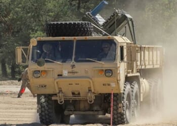 M977 HEMTT with M136 Volcano mine dispensing system.