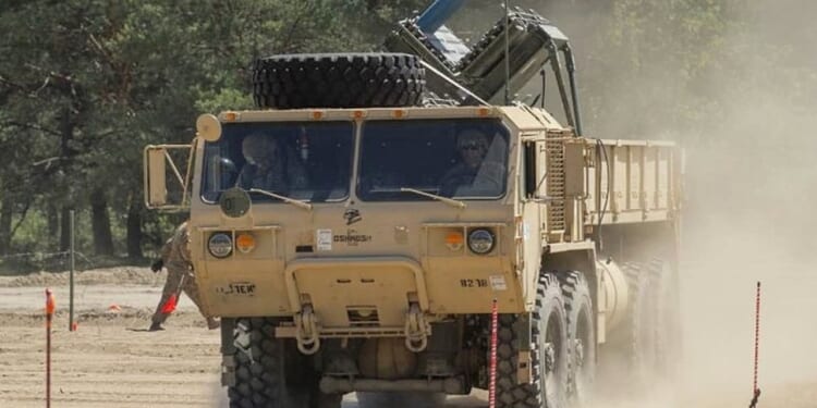 M977 HEMTT with M136 Volcano mine dispensing system.