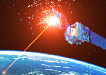 A laser weapon destroying a satellite.