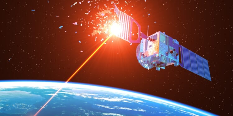 A laser weapon destroying a satellite.