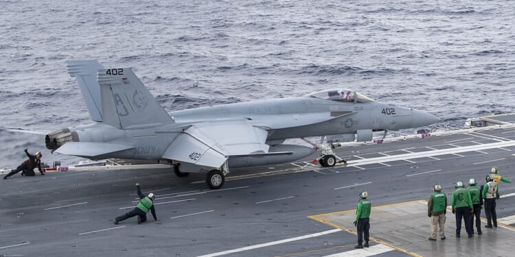 An F/A-18 Hornet on the deck of the USS Gerald Ford.