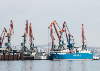 Port infrastructure and container ship in Baku on the Caspian Sea.