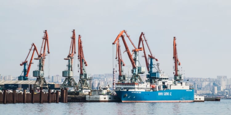 Port infrastructure and container ship in Baku on the Caspian Sea.