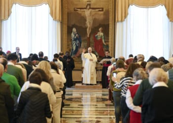Pope Leo XIV meets with a group of pilgrims from St. Thomas of Villanova Parish in Alcalá de Henares, Spain, on Dec. 29, 2025, in the Apostolic Palace at the Vatican.