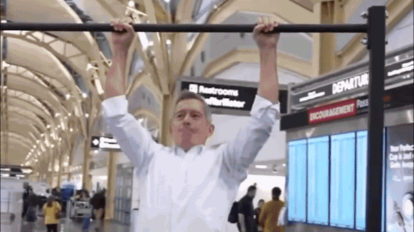 Duffy does pull-ups at Reagan National Airport