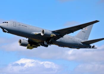 A KC-46 Pegasus with its landing gear down.