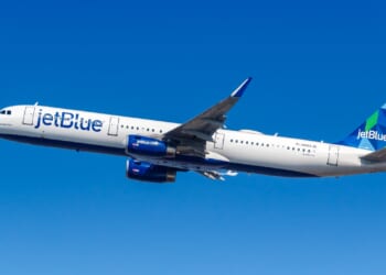A JetBlue plane in flight.