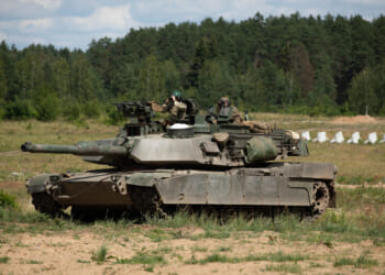 U.S. Army soldiers operate a M1A2 System Enhanced Package V3 Abrams Main Battle Tank during a situational training exercise at Bemowo Piskie Training Area, Poland, July 8, 2025.