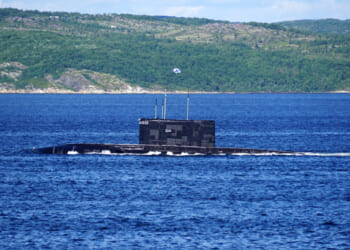 Surfacing of a diesel-electric submarine of Kilo Class in Kola Bay.