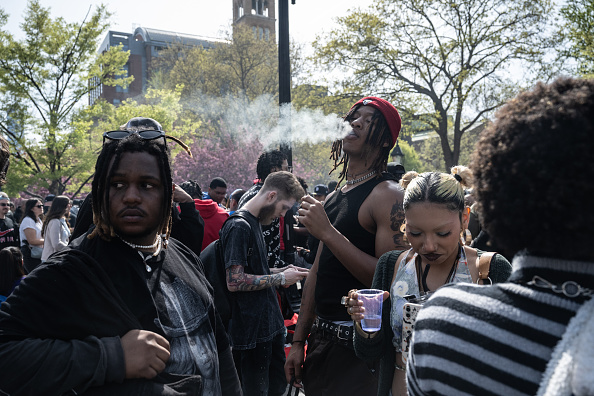 A man smokes marijuana in Washington Square Park in New York City. 