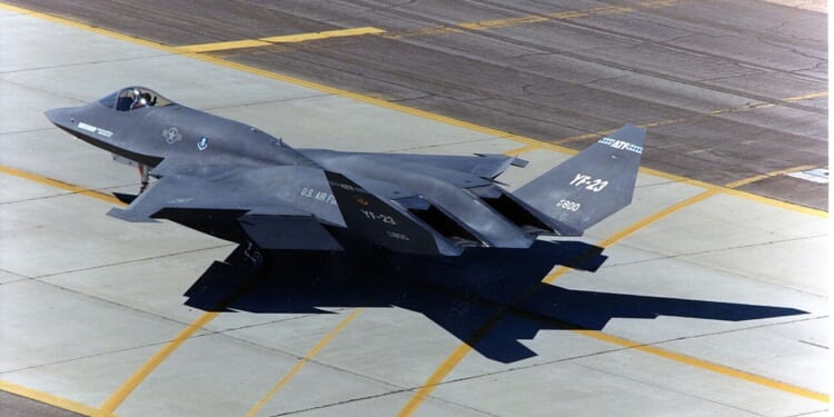 A Northrop YF-23 on a runway.