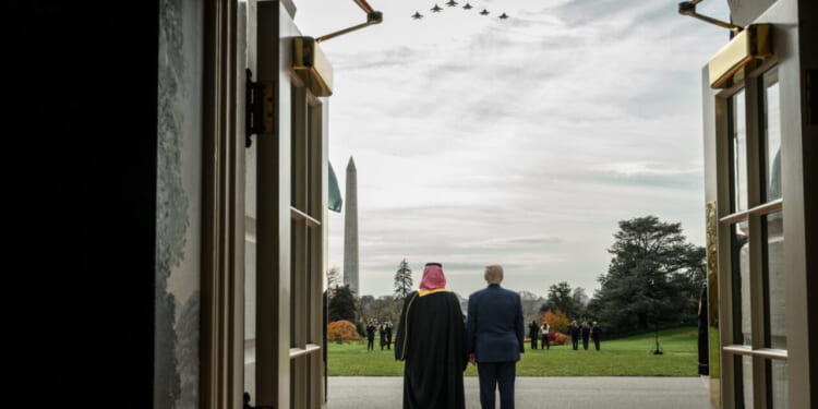 President Doanld Trump observes a US Air Force flyover with Saudi crown prince Mohammed bin Salman.
