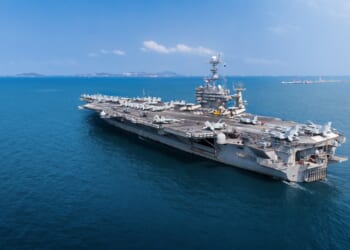 A US Navy aircraft carrier at sea.