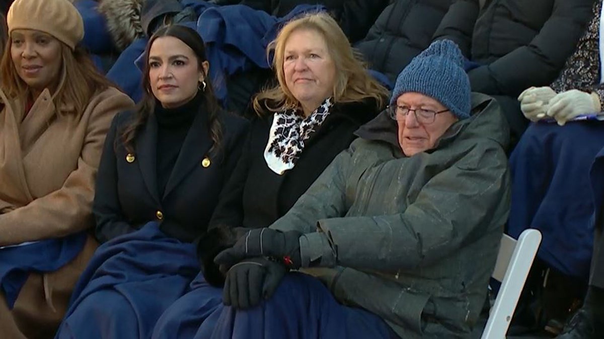 New York Attorney General Letitia James, left, Rep. Alexandria Ocasio-Cortez, D-N.Y. and Sen. Bernie Sanders, I-Vt., attend the inauguration of New York City Mayor Zohran Mamdani, Thursday, Jan. 1, 2026, outside City Hall.