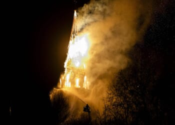 A fire tears through the Vondelkerk church tower in Amsterdam on New Year’s Day, Jan. 1, 2026.