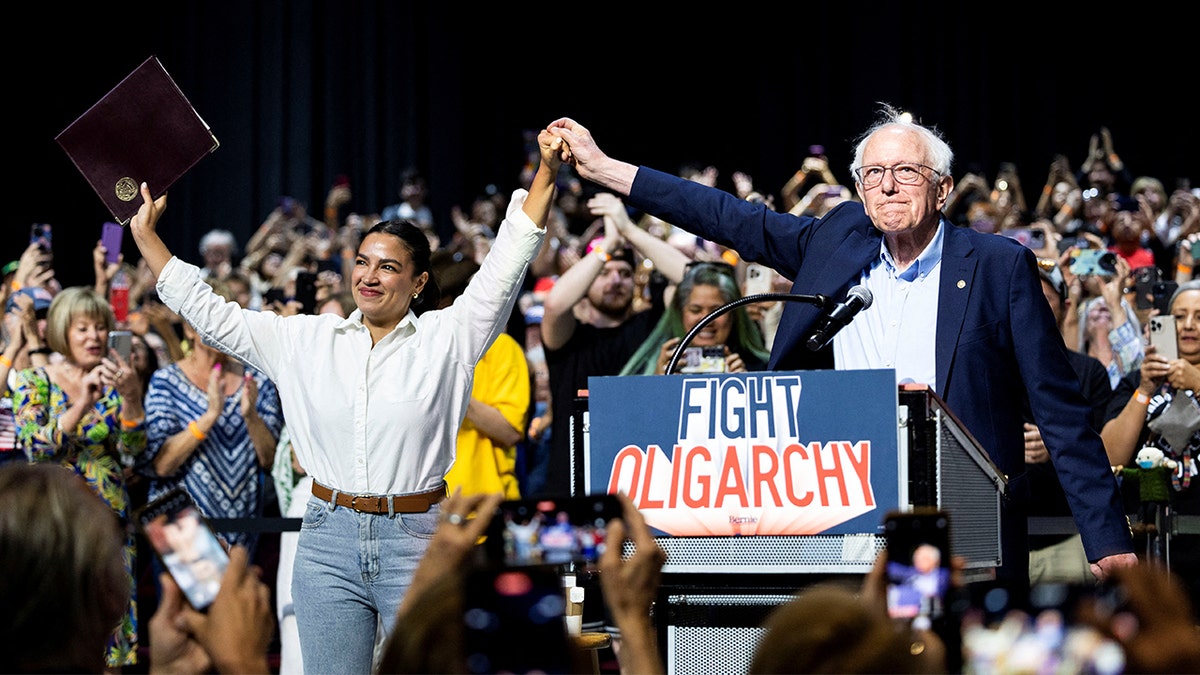 AOC and Bernie Sanders at rally