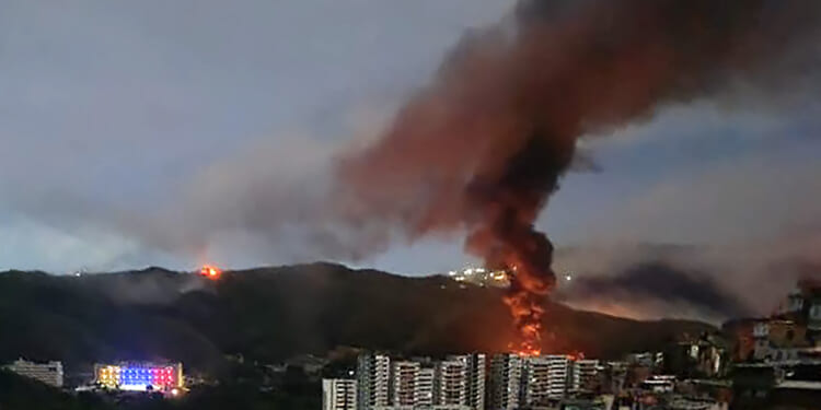 Fires are seen in Caracas, Venezuela after the U.S. launched what President Donald Trump described as a "large scale strike" that included the capture of Venezuelan President Nicolás Maduro, Saturday,...