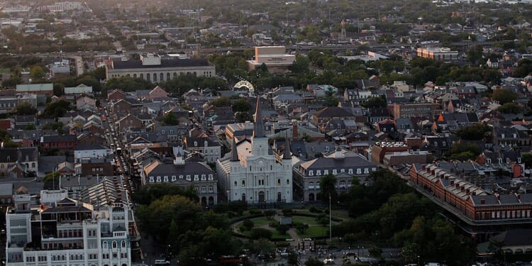 The Saint Louis Cathedral and Jackson Square are seen at sunset near the French Quarter in downtown New Orleans on April 10, 2010.