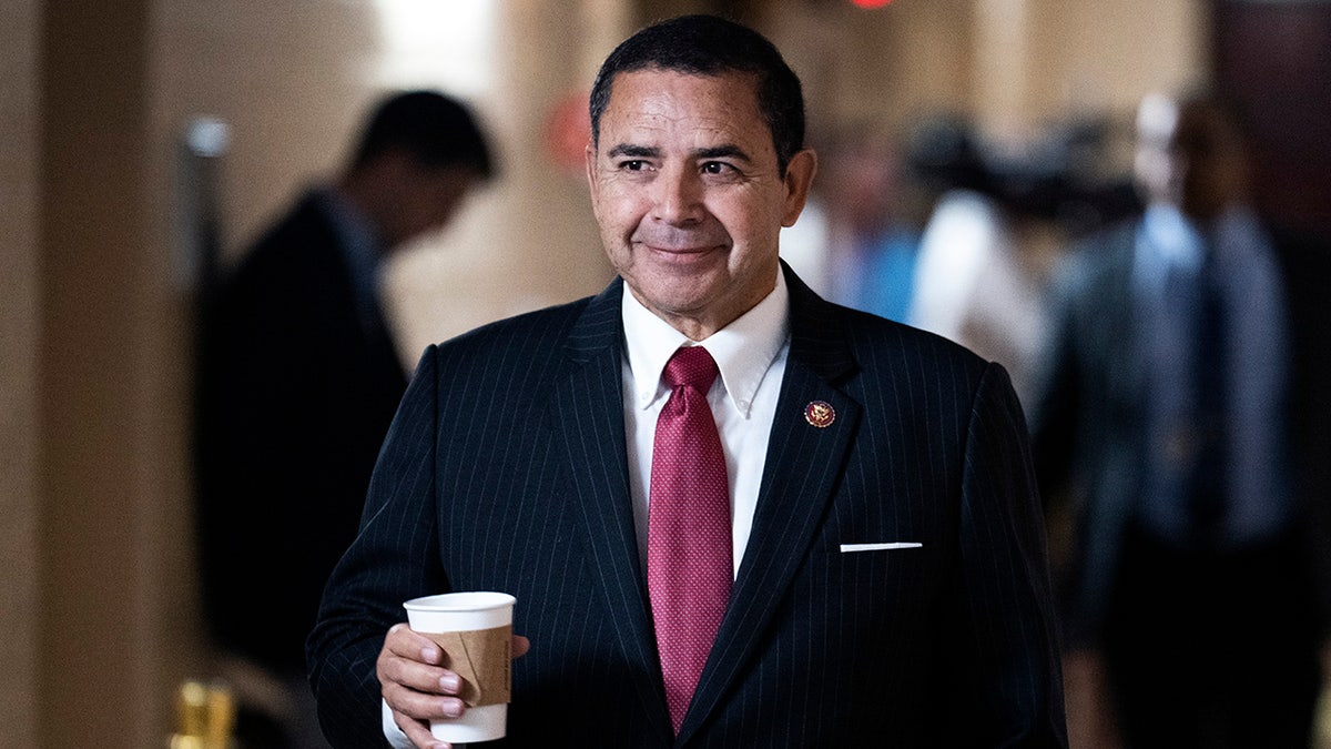 Democratic Texas Rep. Henry Cuellar walks on Capitol Hill.