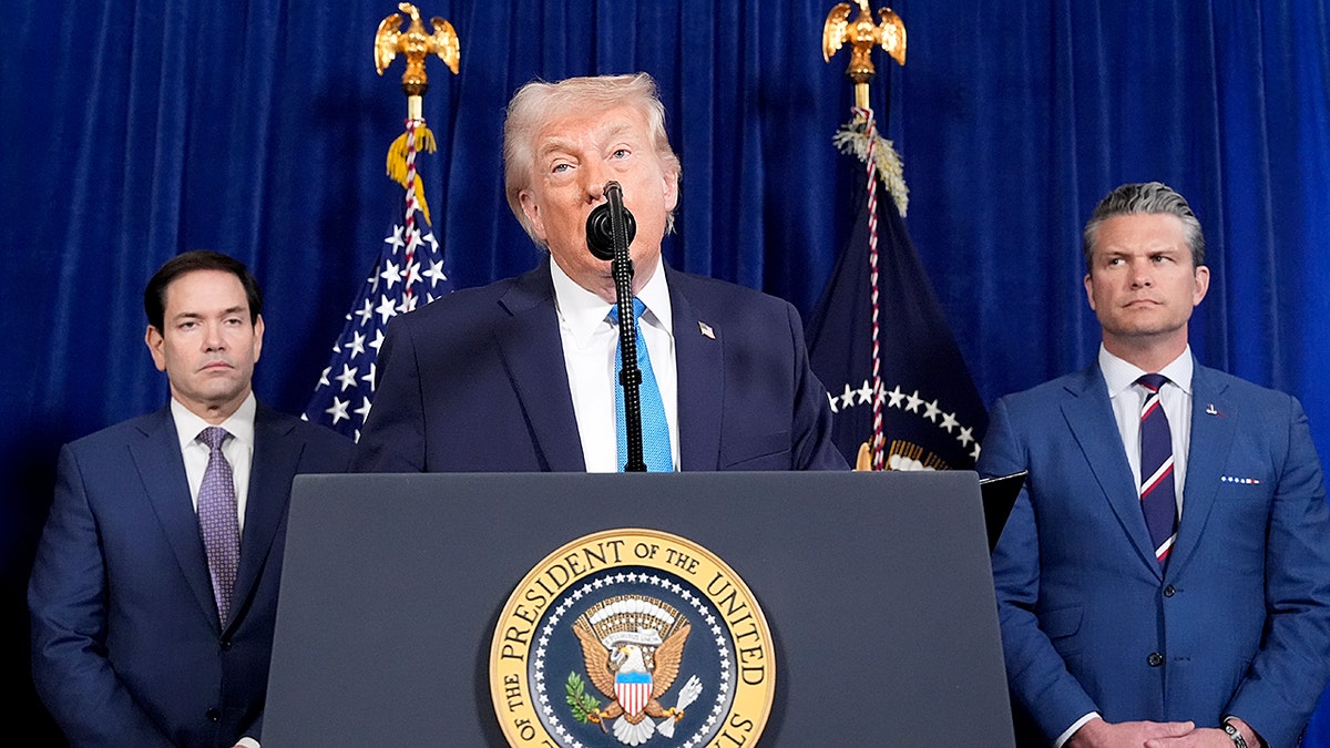 President Donald Trump flanked by Marco Rubio and Pete Hegseth