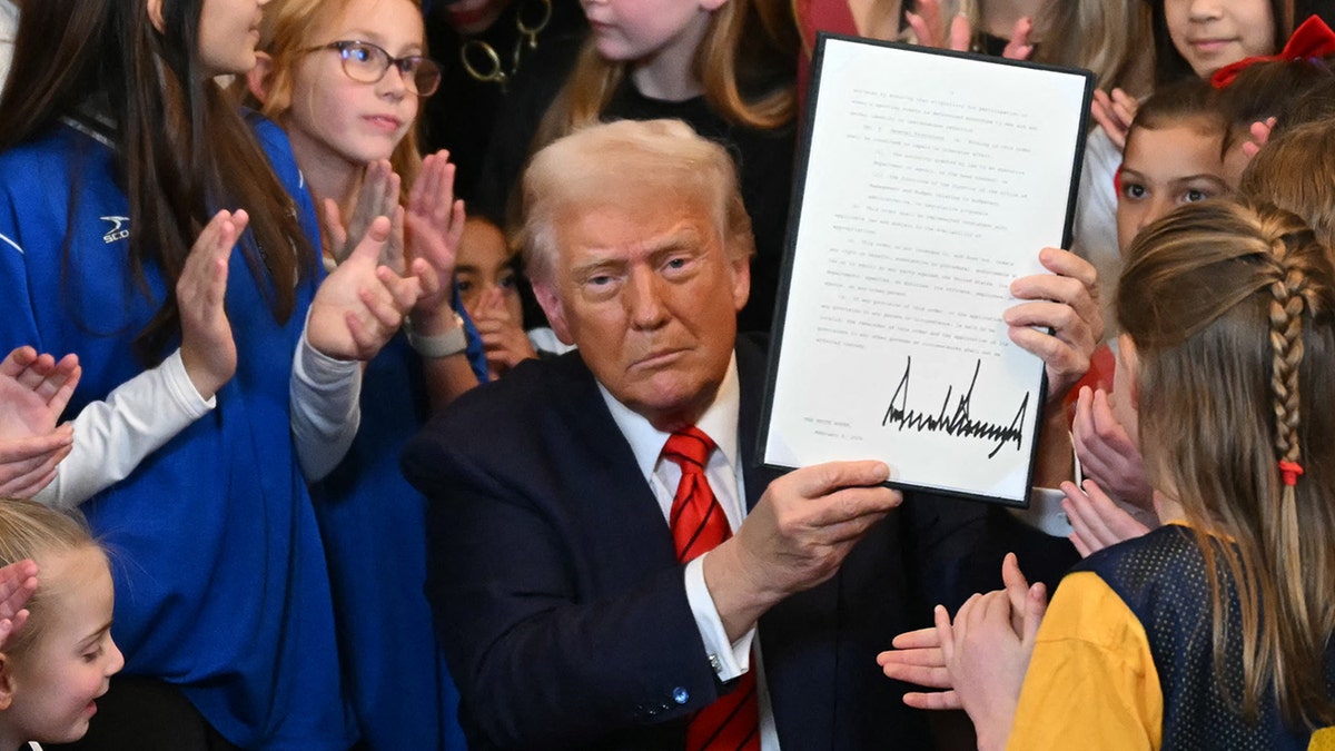 Donald Trump signs an executive order