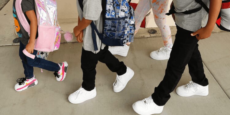 Special education aide drags autistic elementary school student by arm 30 feet down hallway, police say