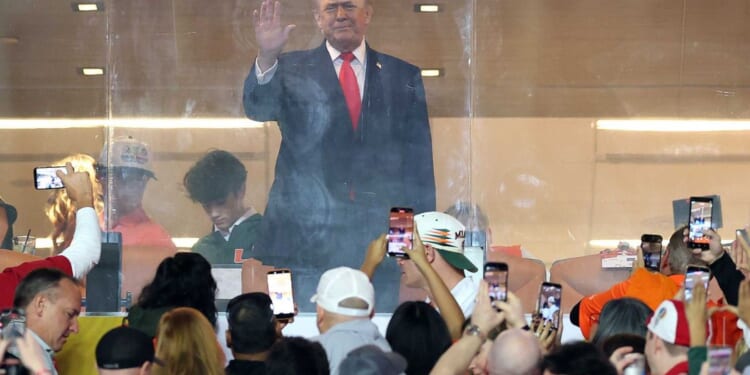 VIDEO: Crowd at college football championship goes wild after Trump appears during national anthem