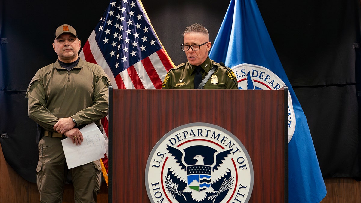 Marcos Charles and Gregory Bovino at presser