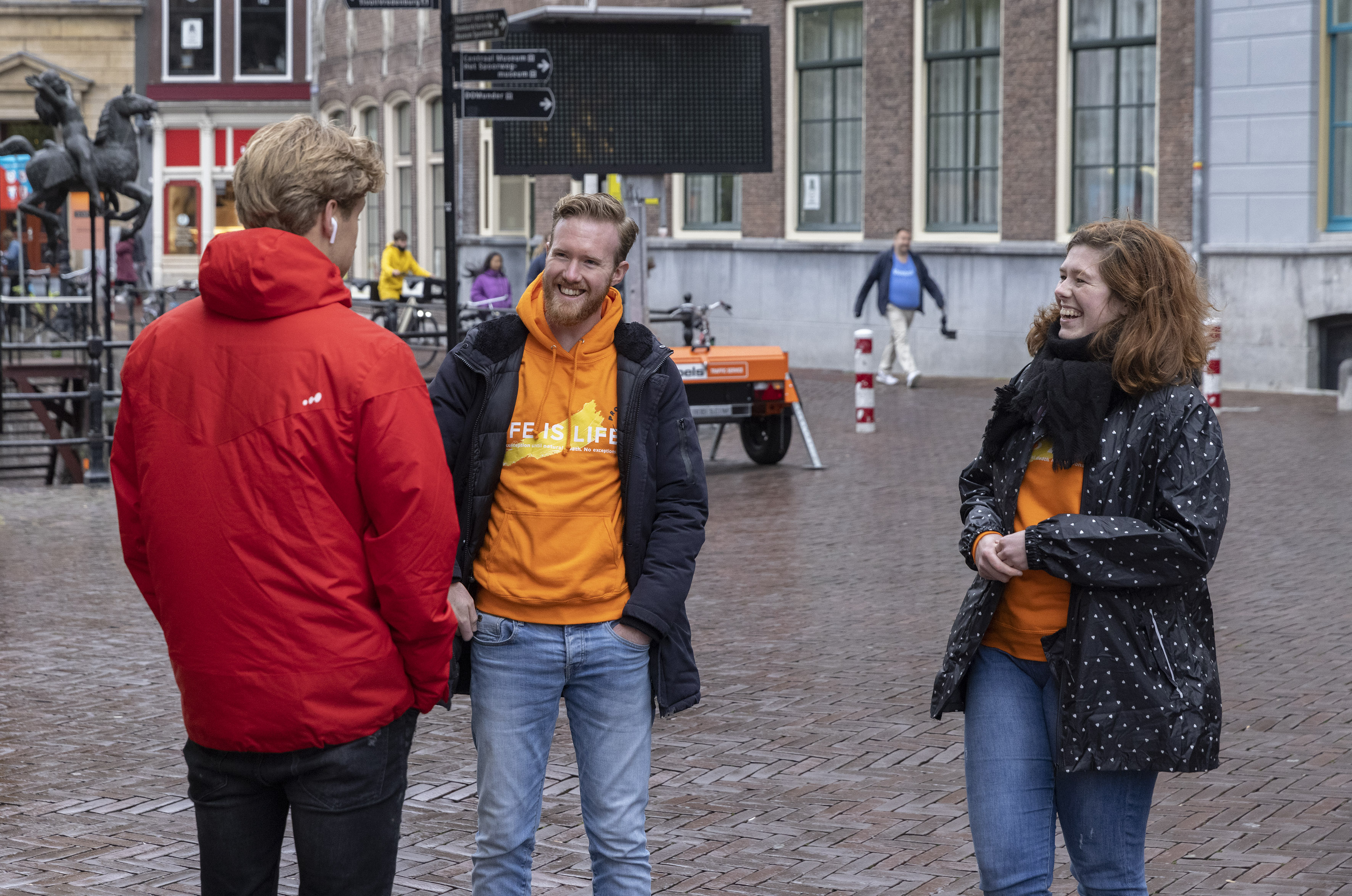 ProLife Europe volunteers Hendrik and Arianne engage in conversation with passersby during a street outreach in Utrecht, Netherlands. | Credit: ProLife Europe