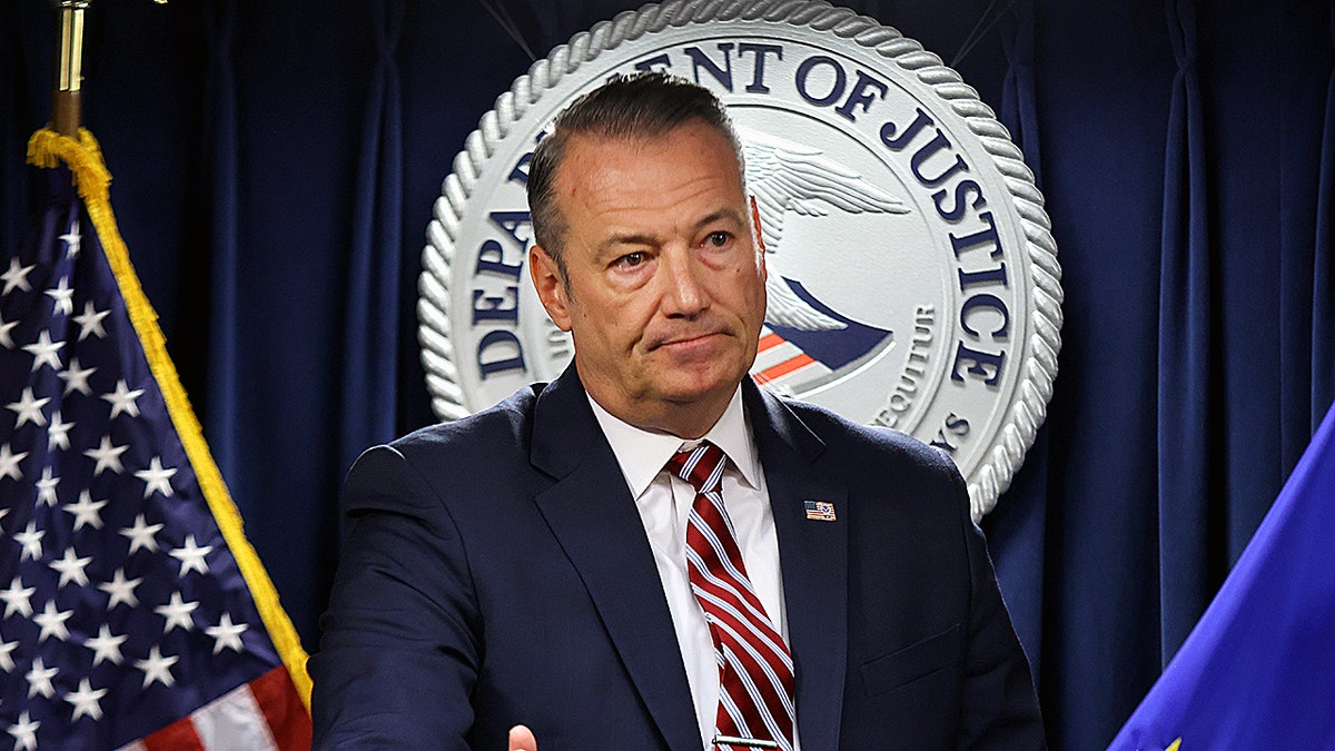 Acting ICE Director Todd Lyons speaks to the media.