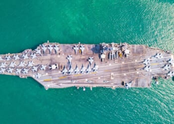 An aircraft carrier at sea.