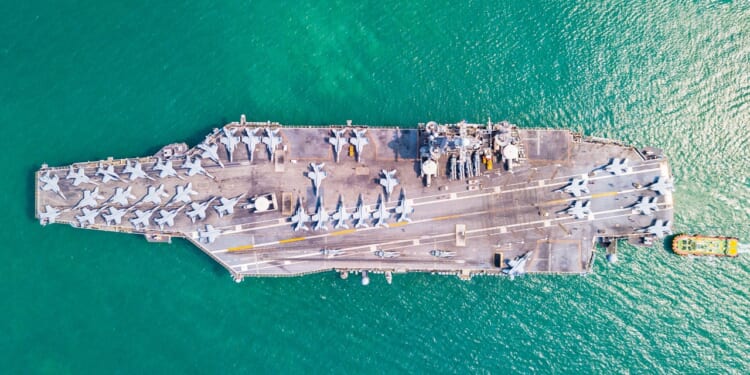 An aircraft carrier at sea.