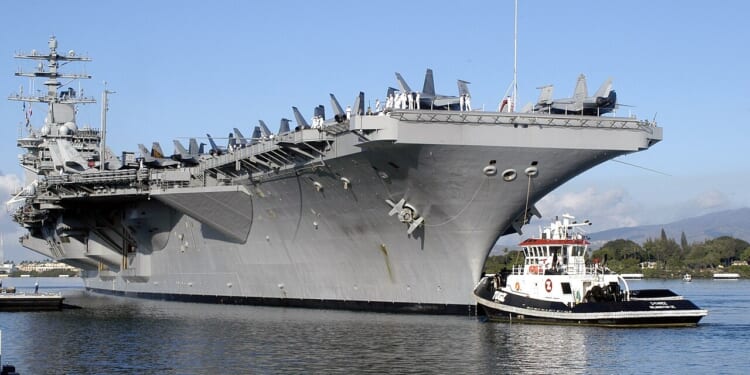 The USS Nimitz in port in Hawaii.