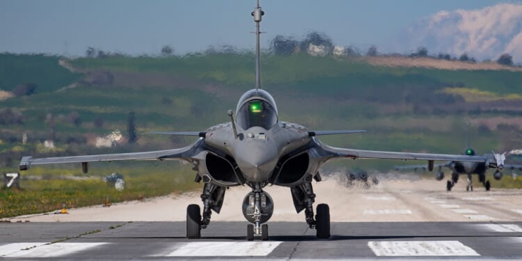 A Rafale fighter jet taxiing for takeoff.