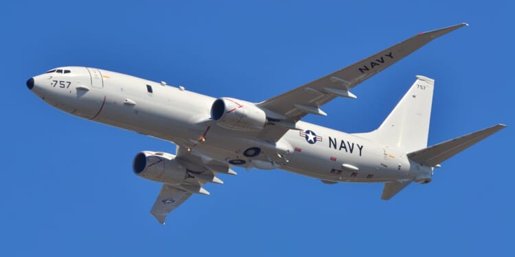 A P-8 Poseidon aircraft in flight.