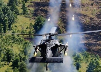 A live fire test involving an MH-60 DAP helicopter.