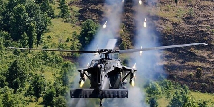A live fire test involving an MH-60 DAP helicopter.