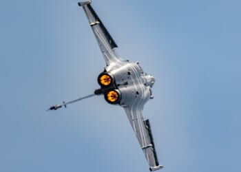 A Dassault Rafale doing a barrel roll.