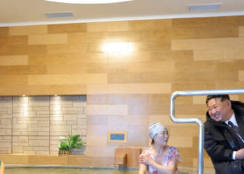 Kim Jong-un, in Massive Coat, Chats Up Visitors in Swimsuits at Hot Spring Resort