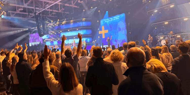 Participants gather for worship at the MEHR conference in Augsburg, Germany, Jan. 3–6, 2026.