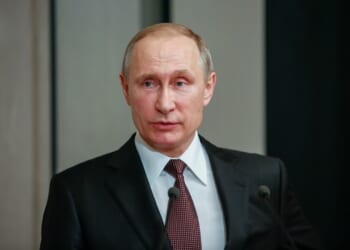 Russian leader Vladimir Putin giving a speech.