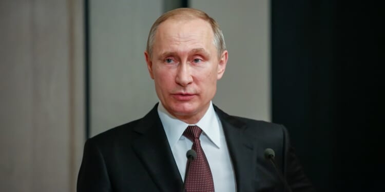 Russian leader Vladimir Putin giving a speech.