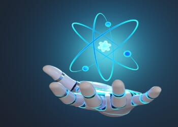 Orbits and structure of an atom floating above the palm of a robot hand in dark background. 3D illustration of the concept of nuclear energy and quantum computing
