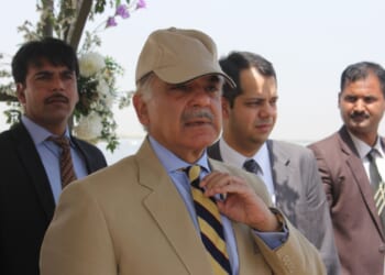 Pakistani prime minister visiting China investment site.