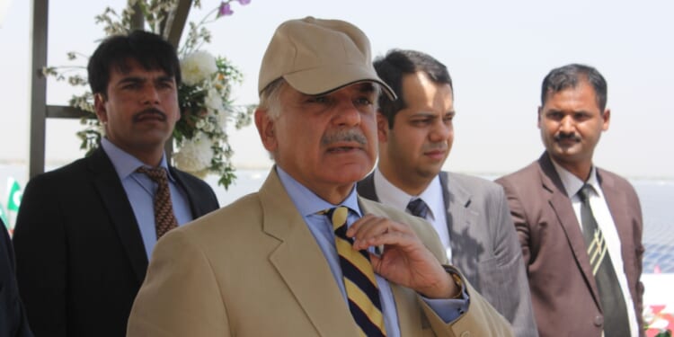 Pakistani prime minister visiting China investment site.